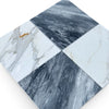 Four marble-patterned tiles from Checkerboard Bardiglio and Calacatta Gold 12X12 Set