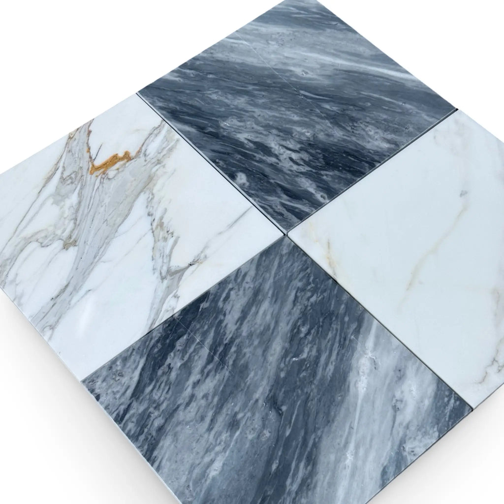 Four marble-patterned tiles from Checkerboard Bardiglio and Calacatta Gold 12X12 Set