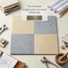 Checkerboard bardiglio and crema marfil 12x12 tile set with natural stone textures in beige and gray tones