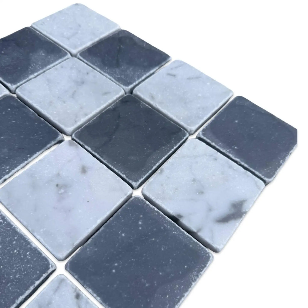 Checkerboard pattern of dark gray Bardiglio and light gray Carrara White marble tiles