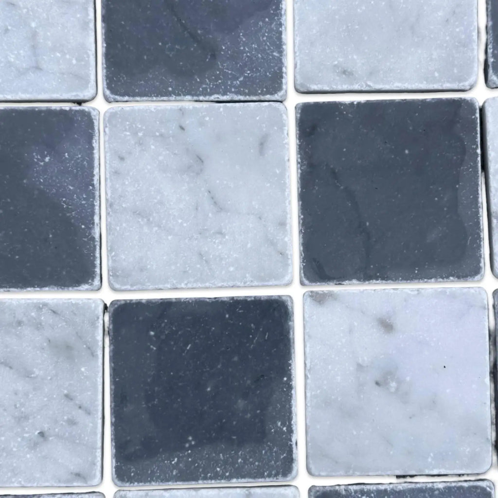 Checkerboard pattern of Grey Bardiglio and Carrara White marble tiles in 3x3 tumbled style