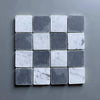 Checkerboard pattern of white Carrara marble and gray Bardiglio tiles in 3x3 tumbled finish