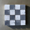 Checkerboard pattern of marble Bardiglio and Carrara White tiles in 3x3 tumbled finish