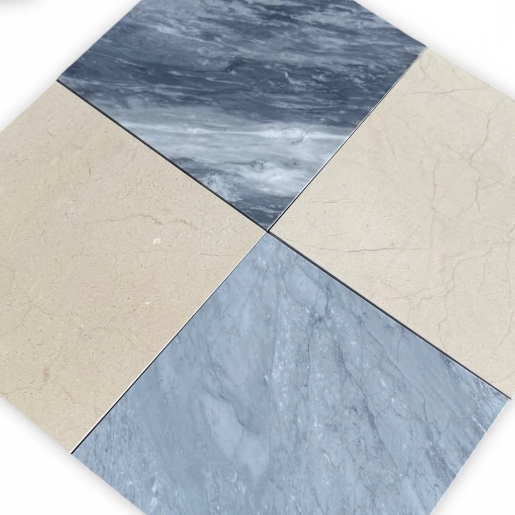 Four square Bardiglio and Crema Marfil marble tiles in an 18x18 inch set