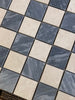 Polished-honed Checkerboard Bardiglio Crema Marfil mosaic tiles in dark gray and beige marble patterns