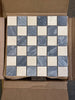 Blue and cream Bardiglio Crema Marfil mosaic tiles in checkerboard pattern