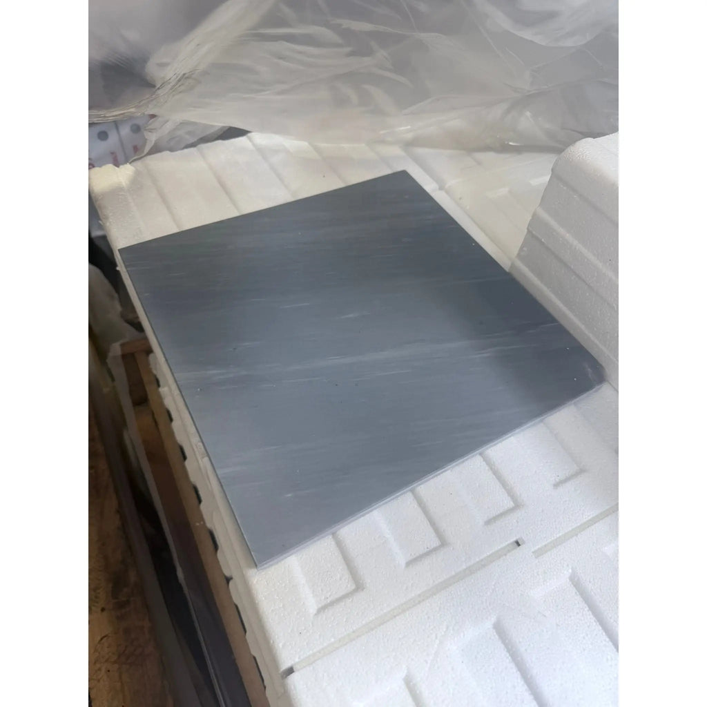 Square gray tile from Checkerboard Bardiglio Imperiale and Bianco Dolomite marble set