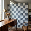 Checkerboard bardiglio nuvolato and bianco carrara marble wall panel with alternating dark gray and white veined squares