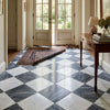 The checkerboard bardiglio nuvolato and oriental white 18x18 marble tile set features a classic black and white diamond pattern floor design