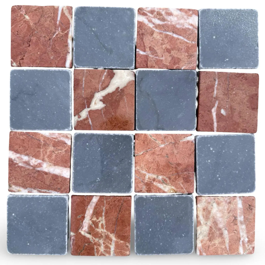 Checkerboard pattern of reddish-brown marble with white veins and solid gray tiles