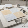 Checkerboard Bianco Carrara and Crema Marfil 12x12 set with polished Spanish marble tile samples in light gray and beige pattern