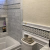Bathroom featuring Checkerboard Bianco Carrara White Marble and Ming Green Marble tiles