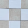 Checkerboard Bianco Dolomite and Crema Marfil 12x12 set with beige and white square tiles