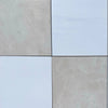 Four square tiles from the Checkerboard Bianco Dolomite and Crema Marfil 12X12 Set