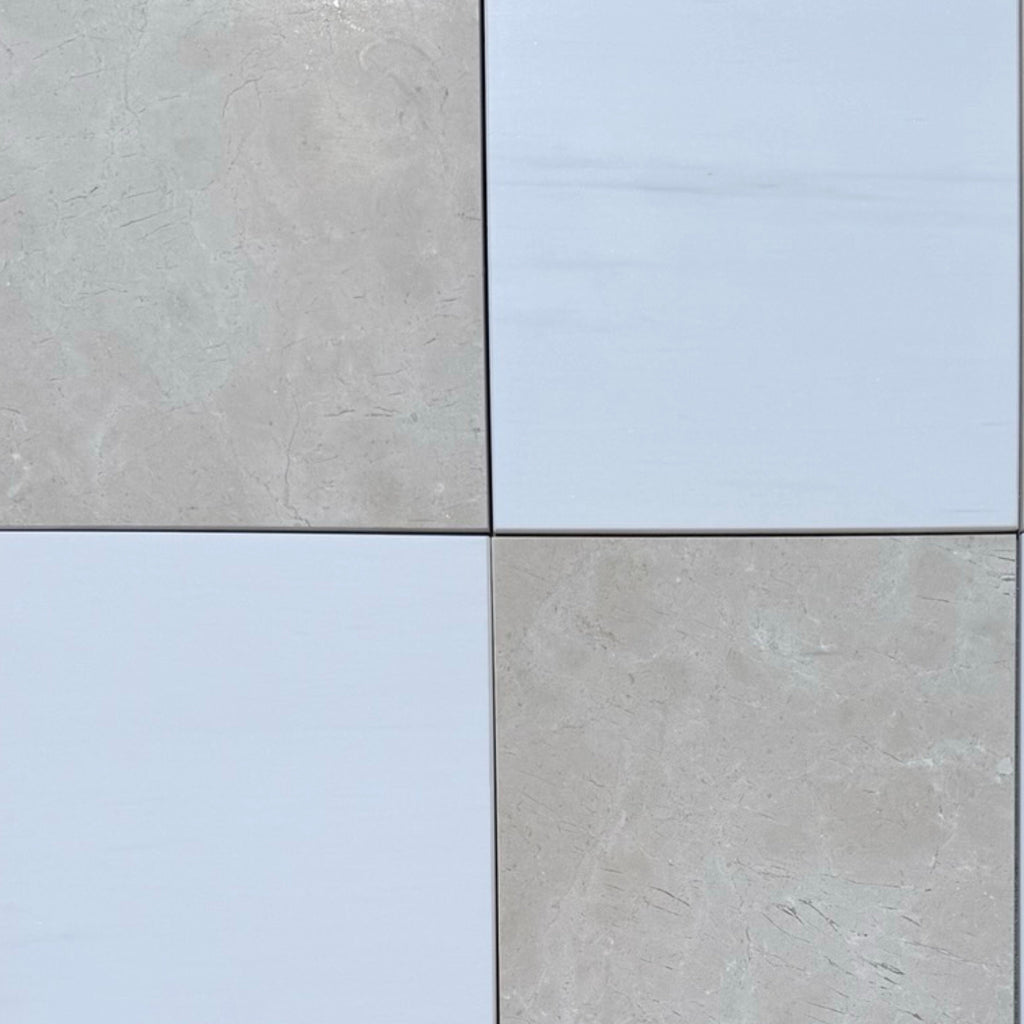 Four square tiles from the Checkerboard Bianco Dolomite and Crema Marfil 12X12 Set