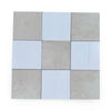 Checkerboard pattern with Nine Bianco Dolomite and Crema Marfil tiles in 12x12 set