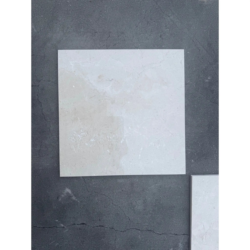 Square off-white tile from the Checkerboard Bianco Dolomite and Crema Marfil 12x12 Set
