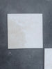 Square off-white tile from the Checkerboard Bianco Dolomite and Crema Marfil 12x12 Set
