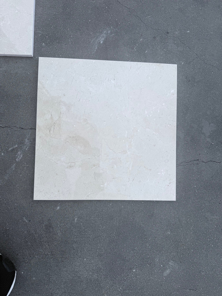 Off-white square tile from Checkerboard Rosso Levanto and Crema Marfil 12X12 Set