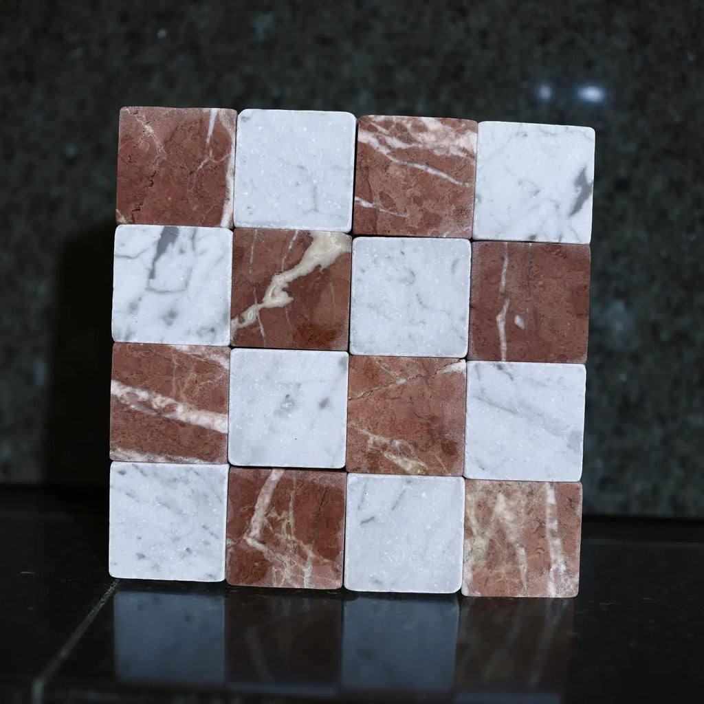 Polished white and reddish-brown marble tiles in a checkerboard pattern for elegant flooring