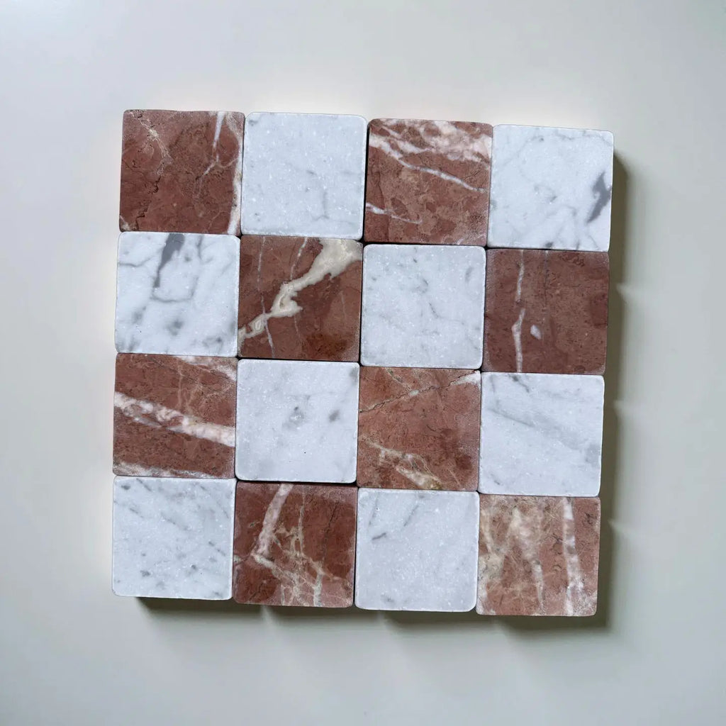 Checkerboard pattern of white Carrara marble and reddish-brown Rojo Alicante tiles