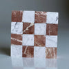 Checkerboard pattern of Carrara White and Rojo Alicante marble tiles, 3x3 tumbled