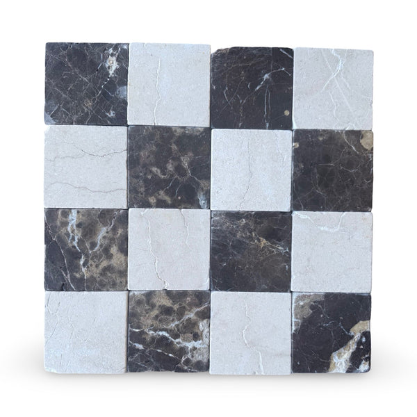 Checkerboard pattern of Crema Marfil and Emperador Dark marble tiles set