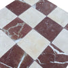 Checkerboard Crema Marfil and Rojo Alicante marble tiles with natural veining pattern