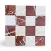 Polished checkerboard pattern of Crema Marfil and Rojo Alicante marble tiles