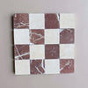 Checkerboard pattern of Crema Marfil and Rojo Alicante marble tiles in 4x4 tumbled finish