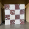 Checkerboard pattern of Cremamarfil and Rojo Alicante marble tiles in cream and reddish-brown hues