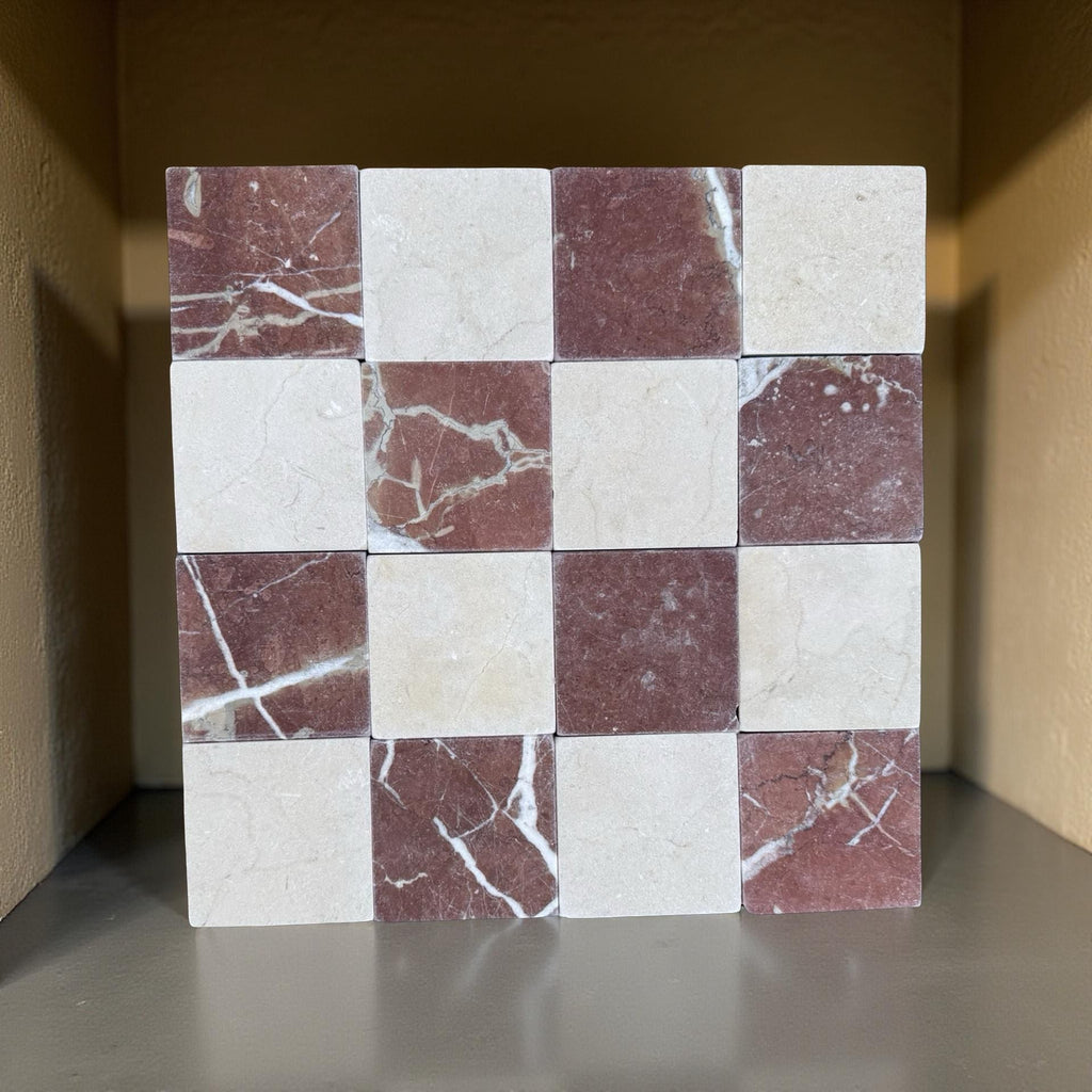 Checkerboard pattern of Cremamarfil and Rojo Alicante marble tiles in cream and reddish-brown hues