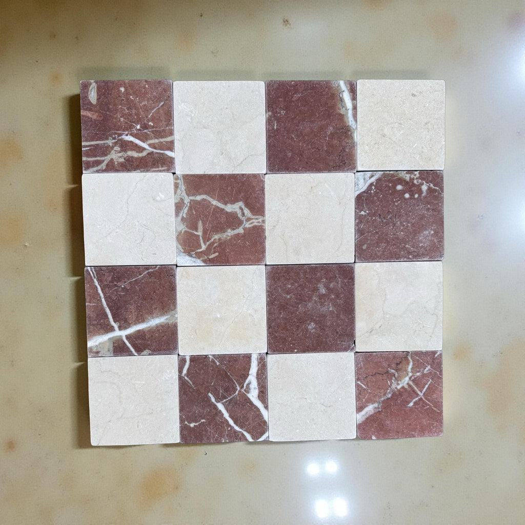 Checkerboard pattern of square marble tiles in Burgundy and Off-White for Checkerboard Crema Marfil Rojo Alicante 4X4 Tumbled