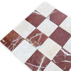 Checkerboard Crema Marfil and Rojo Alicante marble tiles in red and white tumbled pattern