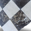 Checkerboard Emperador Dark marble and Crema Marfil tiles with alternating dark and light pattern