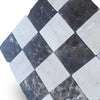 Checkerboard marble tile pattern featuring Emperador Dark and Crema Marfil stones