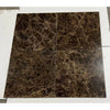 Four square brown Emperador Dark marble tiles with golden veining