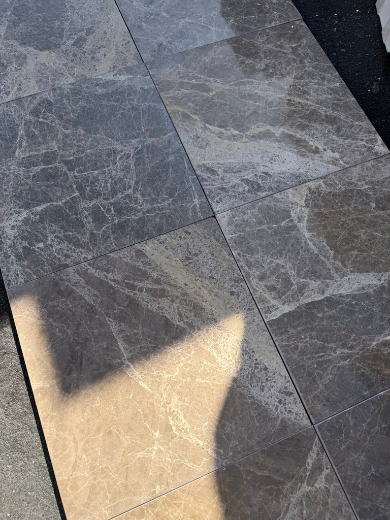 Dark gray Emperador marble tiles with subtle white veining, 12x12 checkerboard set