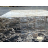 Dark gray Emperador marble slab with white beige veining in 12x12 set