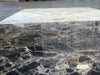 Dark gray Emperador marble slab with white beige veining in 12x12 set