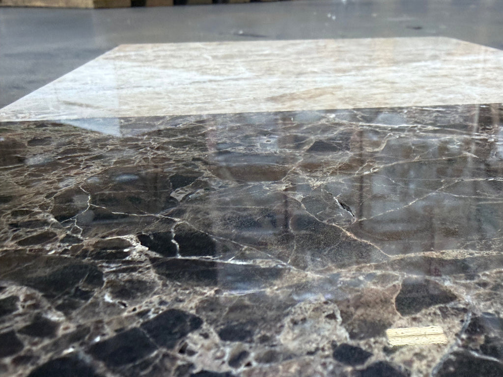 Dark gray Emperador marble slab with white beige veining in 12x12 set