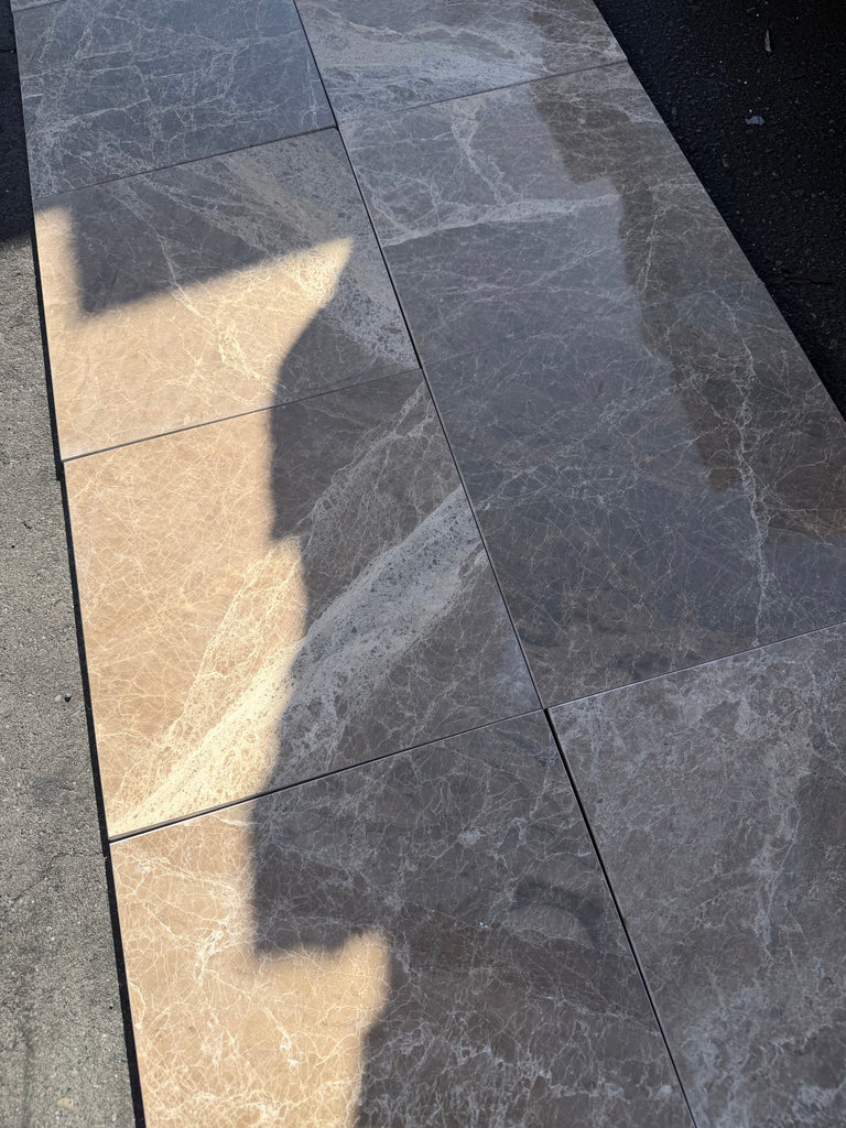 Checkerboard Emperador Dark marble tiles with white veining, 12x12 polished set