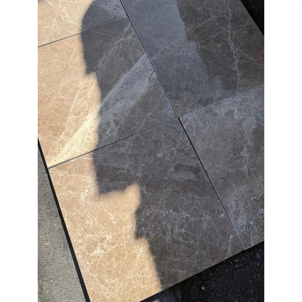 Shiny gray and beige Emperador marble 12x12 checkerboard tiles with veining