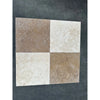 Four-square patterned ivory and Noce travertine tumbled 18x18 inch tiles for flooring