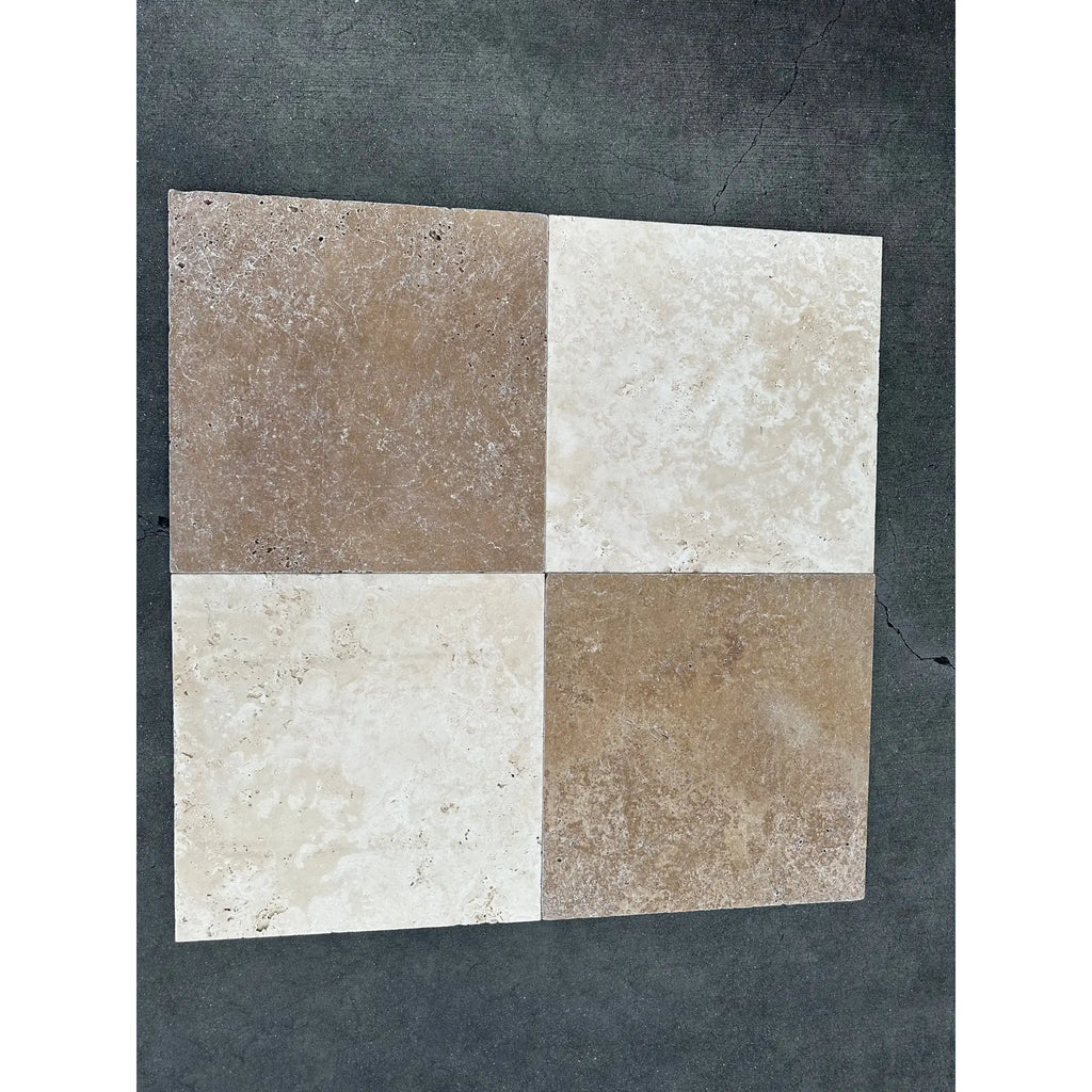 Four-square patterned ivory and Noce travertine tumbled 18x18 inch tiles for flooring