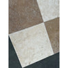 Square travertine tiles from Checkerboard Ivory and Noce set in 18x18 inches