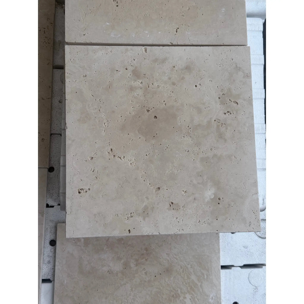 Beige travertine tiles in Checkerboard Ivory and Noce 12X12 set for elegant interiors