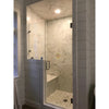 Modern marble shower stall featuring Checkerboard Ming Green and Calacatta Gold Marble