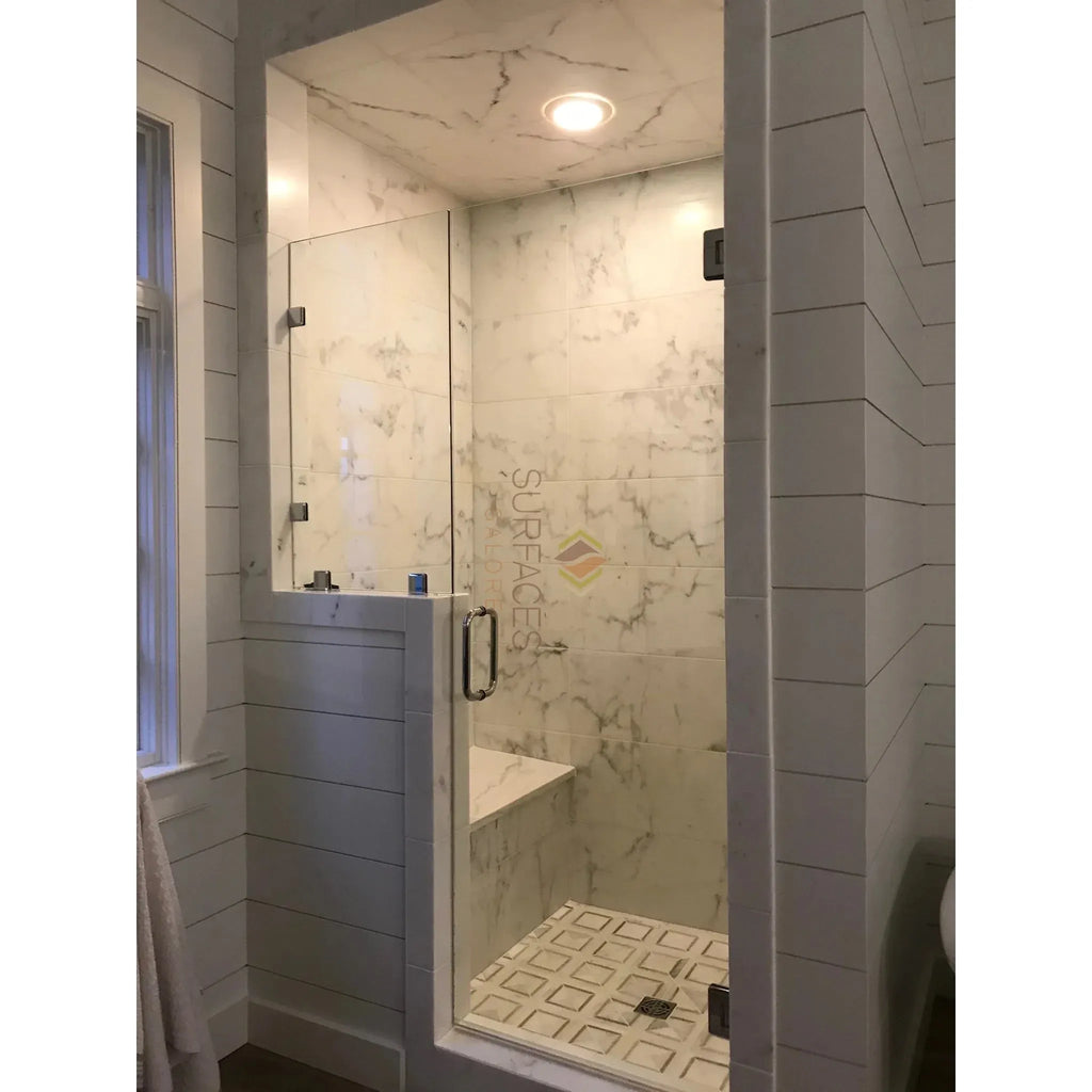 Modern marble shower stall featuring Checkerboard Ming Green and Calacatta Gold Marble