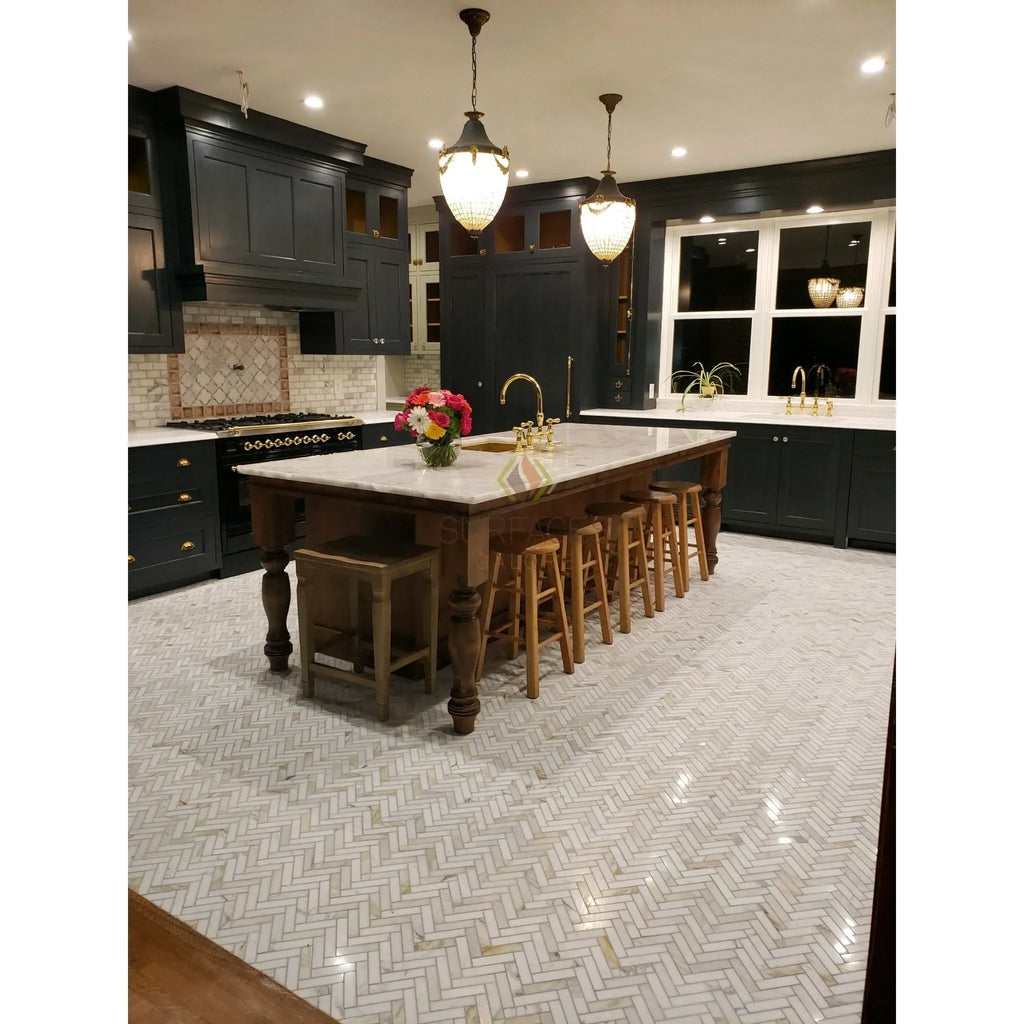 Spacious kitchen island featuring Checkerboard Ming Green and Calacatta Gold Marble